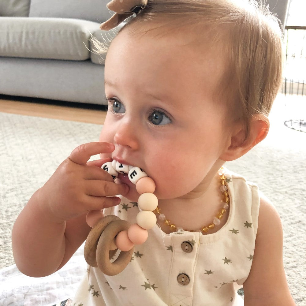 Personalised Silicone Beads On Wooden Rings Teether Rattle