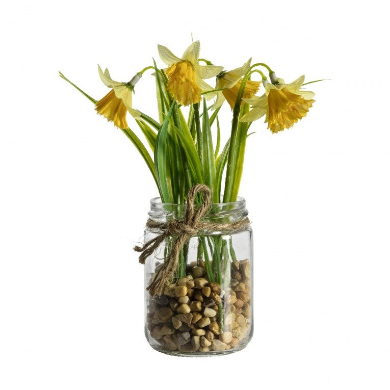 Bright Artificial Daffodils Bunch in a Glass Jar