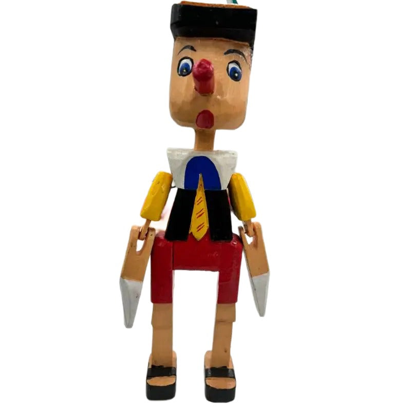 Wooden Handcrafted Sitting Pinnocchio - 7x10x20cms
