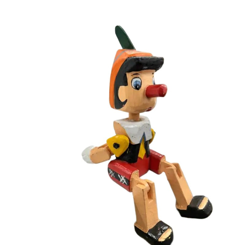 Wooden Handcrafted Sitting Pinnocchio - 7x10x20cms