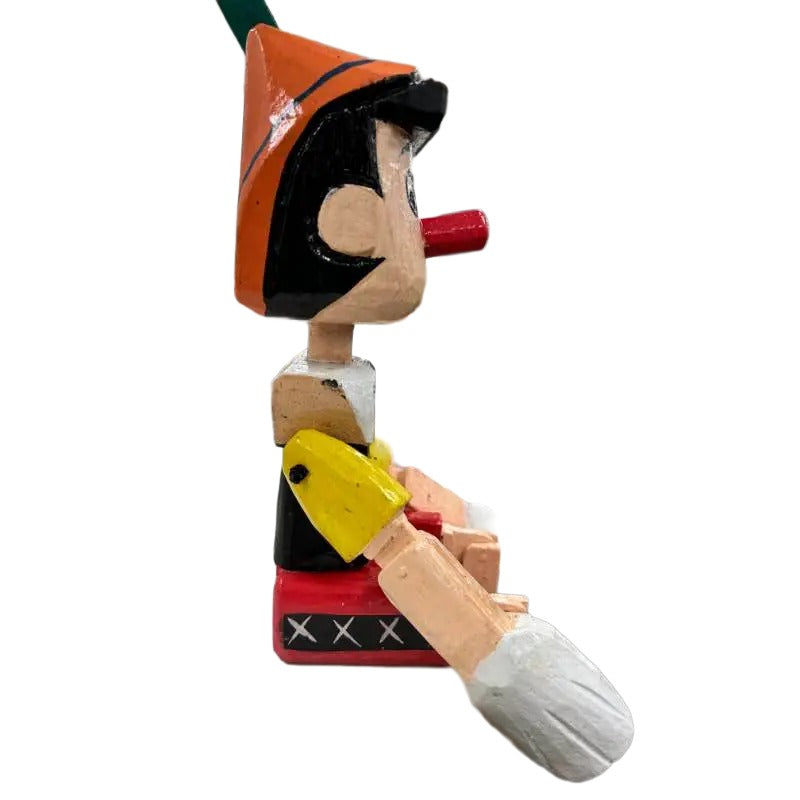 Wooden Handcrafted Sitting Pinocchio - 9x16x40cms