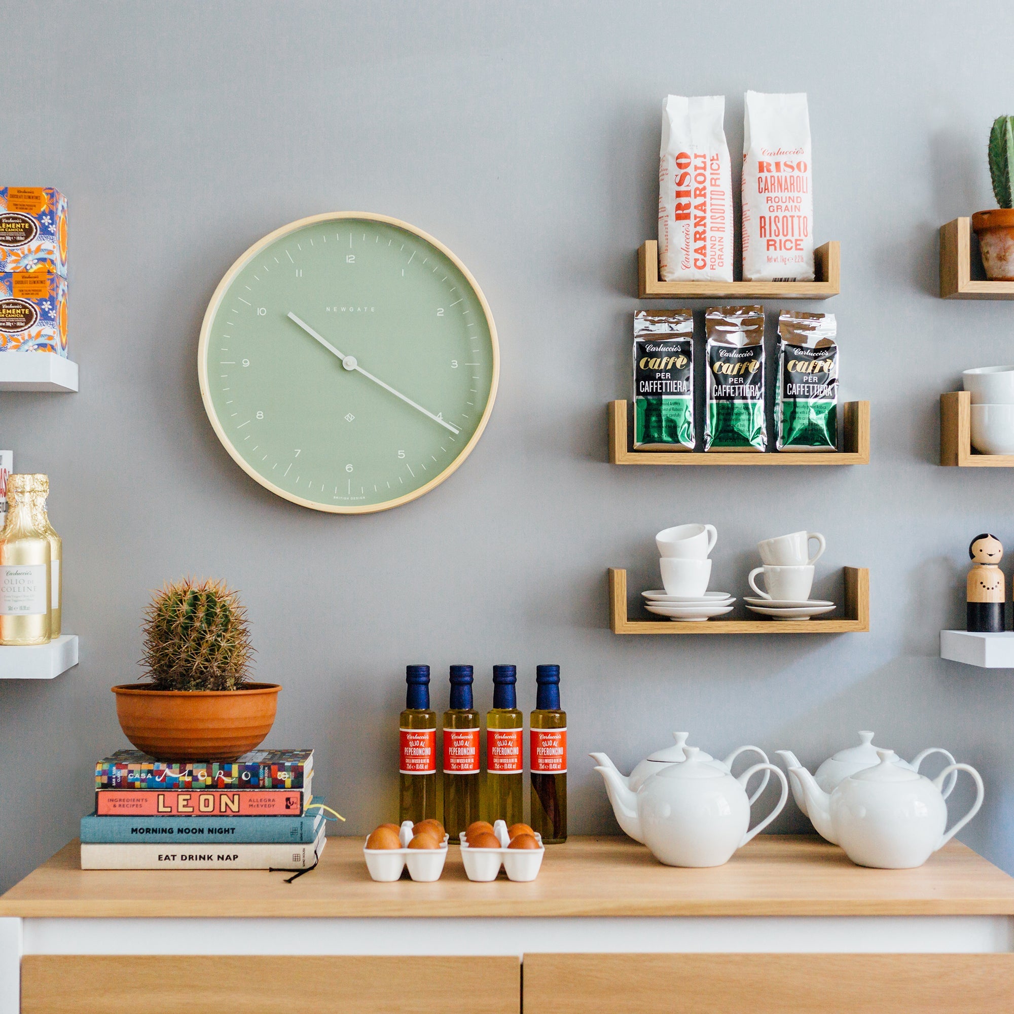 Newgate Mr Clarke Wall Clock Pale Wood Bubble Green Dial